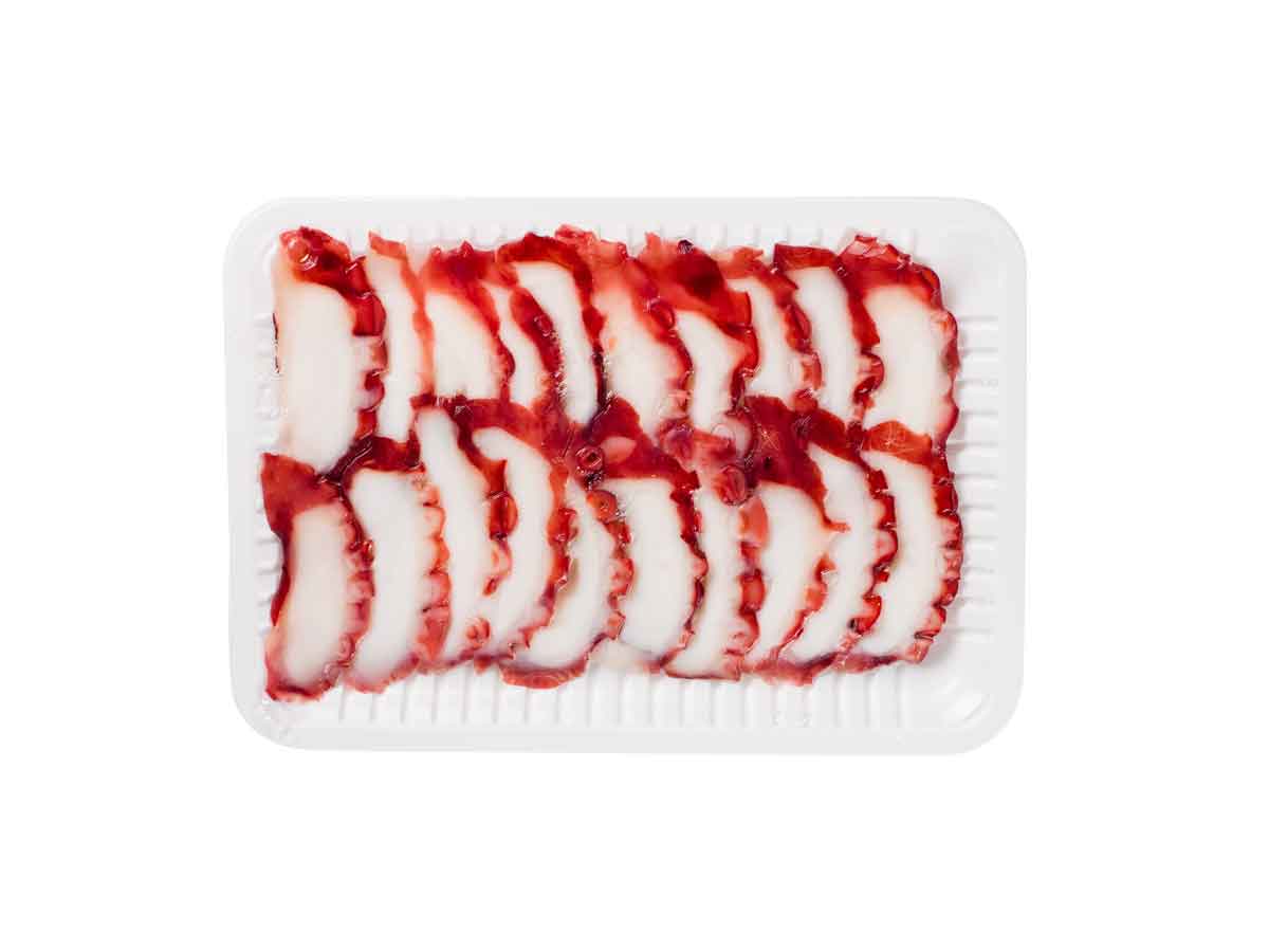 Frisch verpackte, in Scheiben geschnittene Oktopus-Tentakel